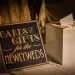A table with card and wedding gifts.