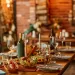 A table with charcuterie items inside of a cabin.