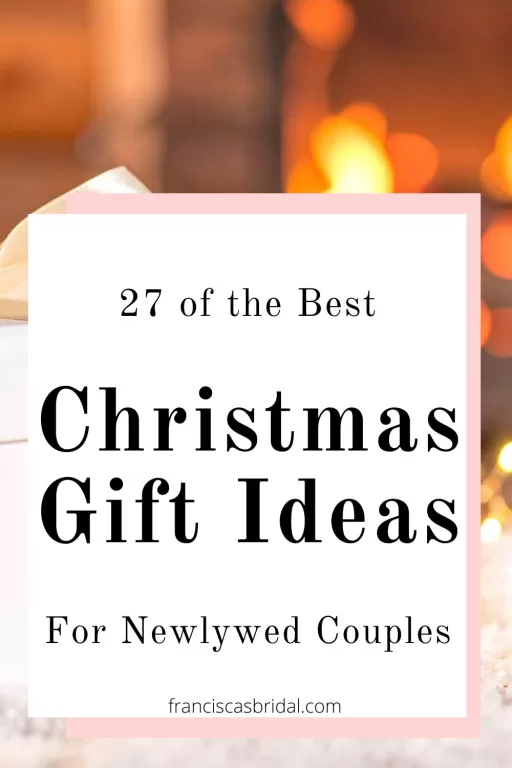 A white gift box sitting next to a lit fireplace.