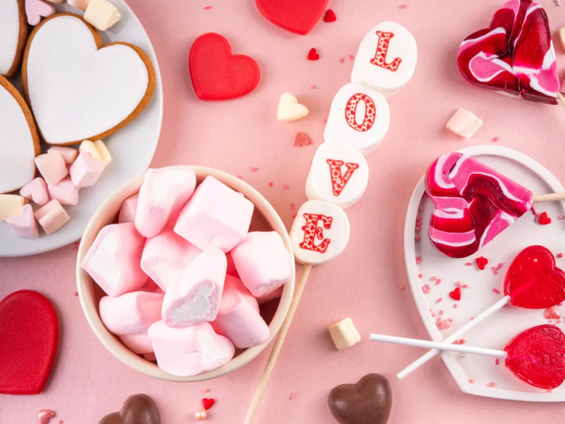 A table with a variety of valentine's sweets.