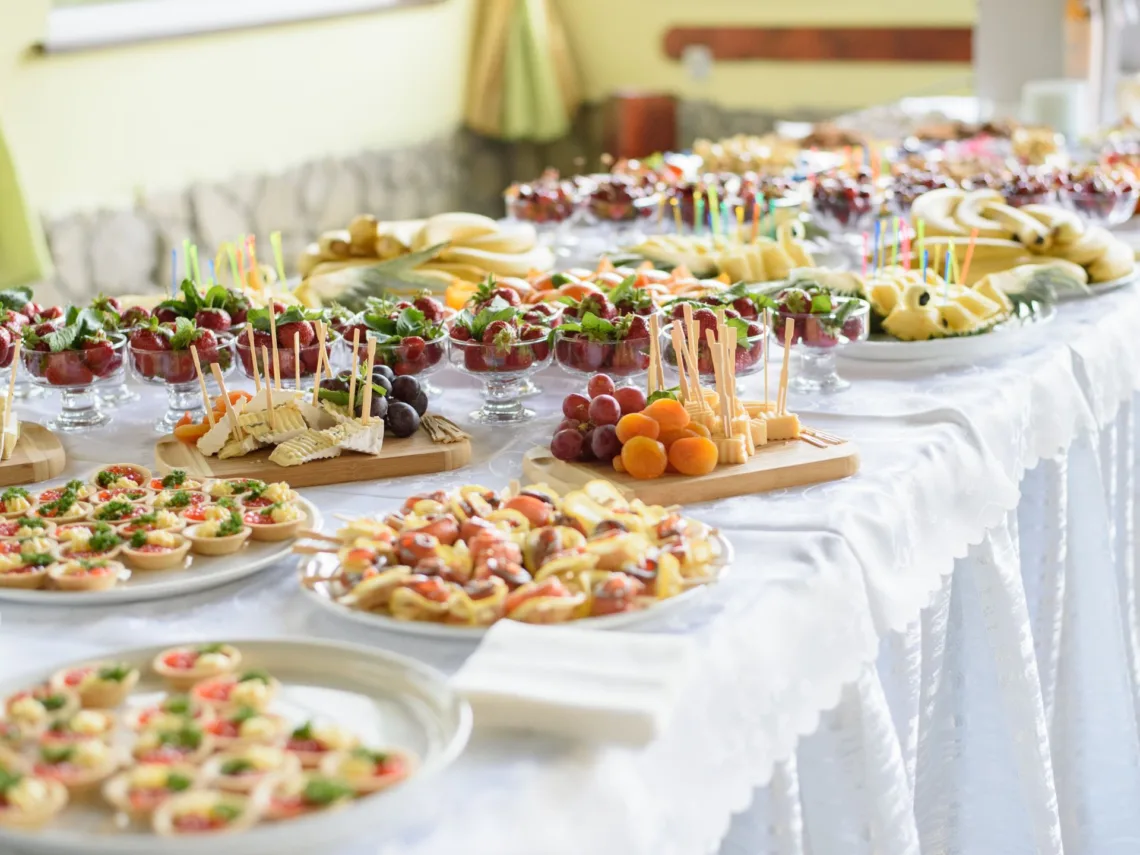 A wedding table with mini late night wedding snacks.