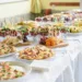A wedding table with mini late night wedding snacks.