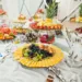 A wedding table with charcuterie items.